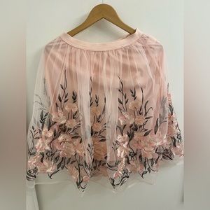 Pink flower skirt with ballerina top and light pink cardigan.